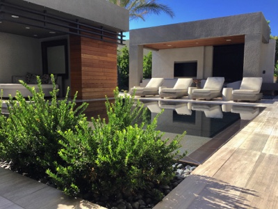 White lounge chairs by pool